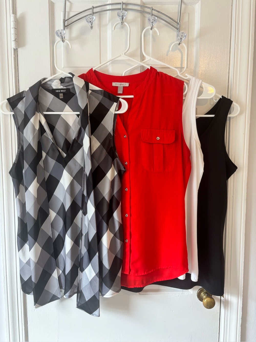 Bundle of 4 sleeveless summer tops.